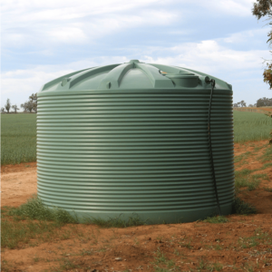20000L Green Water Tank on a field