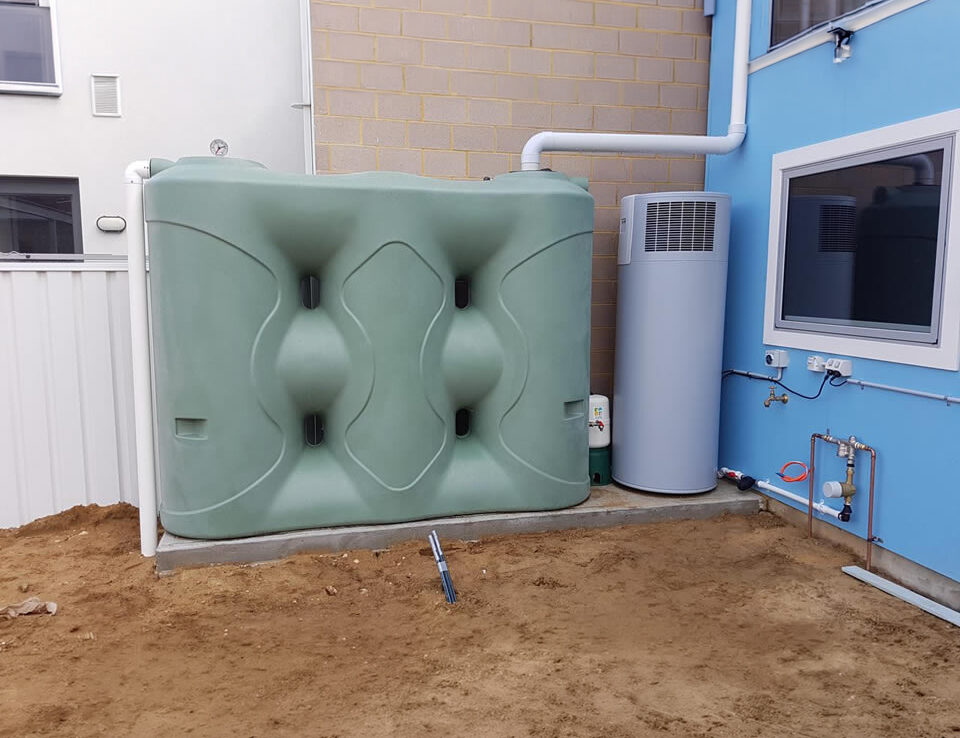 3000L-Green-poly-slimline-tank-connected-to-house-sm