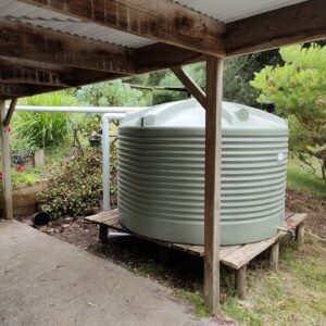 Polymaster light green water tank installed on a residential property