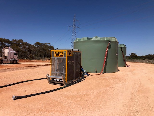 RWT50KL In-Situ-WEB (2 tanks installed over a field, brown land-2)