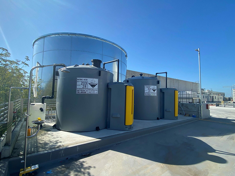 10000L Self Bunded Chemical Tanks installed in an industrial yard, outdoor infront of a large steel tank