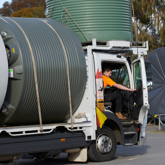 Water tanks loaded in a truck for delivery